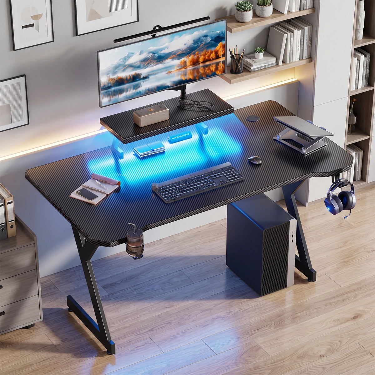 FRODROVIA Ergonomic Gaming Desk with Elevated Monitor Riser Stand & Built-in LED Light Strip, Large Curved Carbon Fiber Surface Computer Desk, Gaming Workstation with Cup Holder & Headphone Hook for Gaming Streaming Home Offi